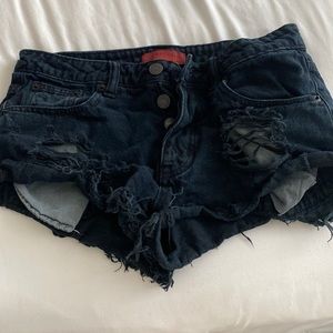 Black ripped shorts